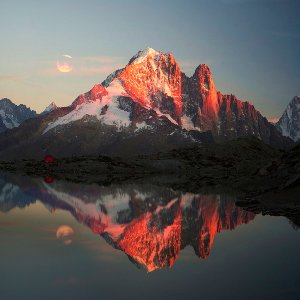 Mountain panorama with lake in evening mood