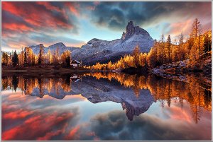 Reflecting mountains at sunrise