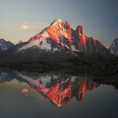 Mountain panorama with lake in evening mood